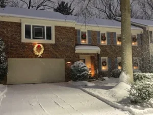Snow-covered Fairfax neighborhood with homes preparing for winter