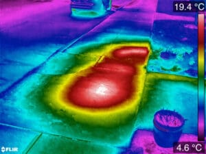 plumber using thermal camera to find frozen pipe alexandria va
